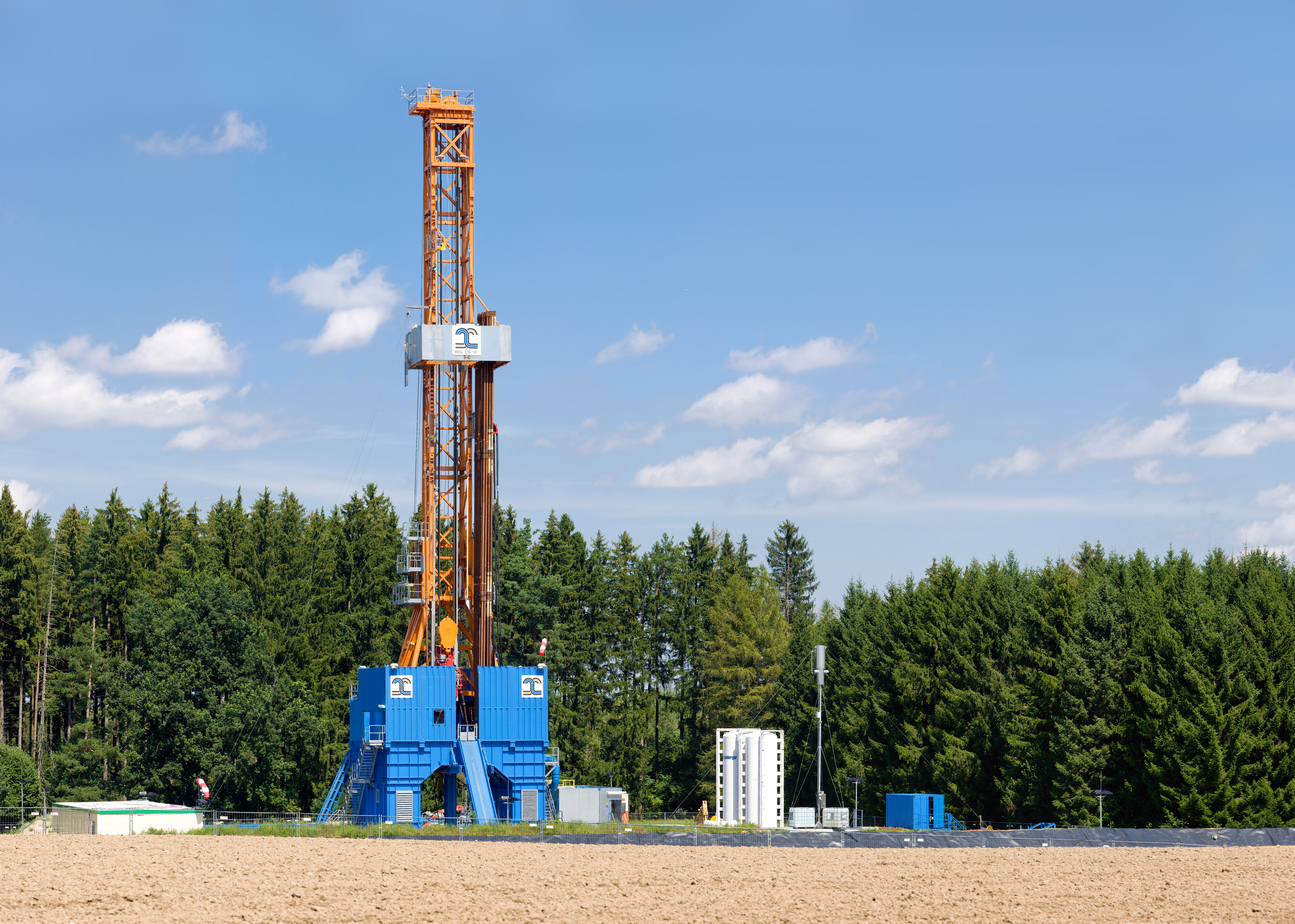 Geothermal drilling tower at a well site